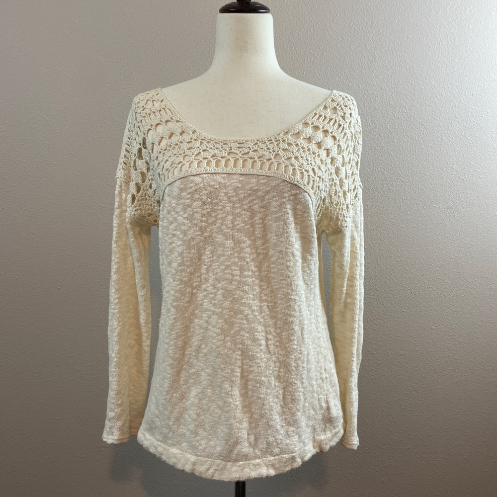 Beige Anthropologie sweater featuring distinct crochet yoke detail